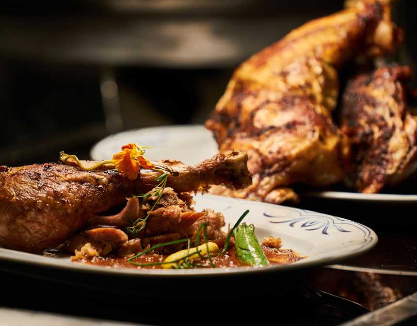 Cooked chicken on white plate