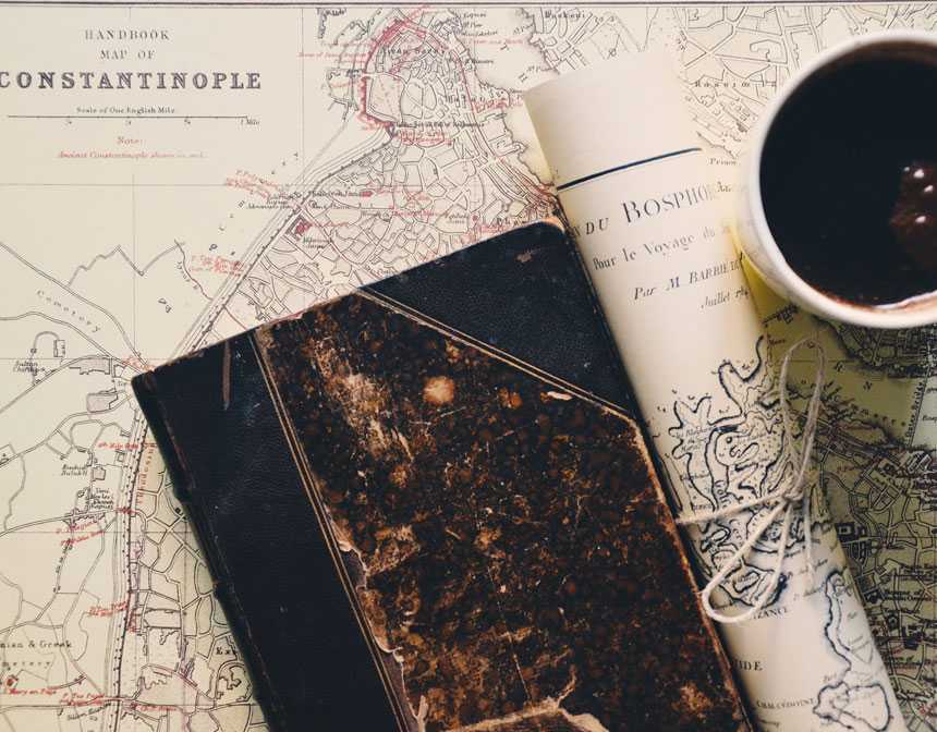 Cup of coffee on top of the map of Istanbul