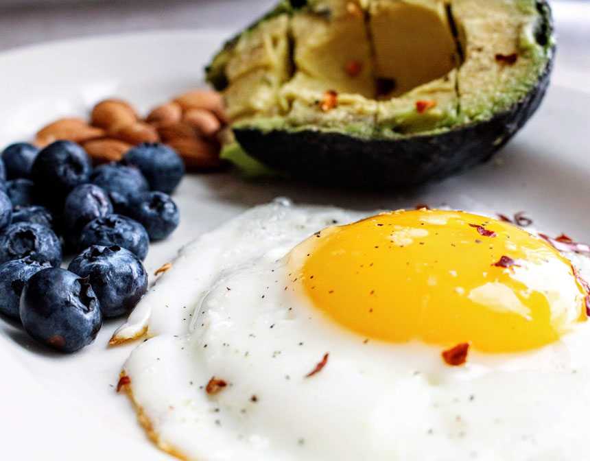 Egg near blueberries