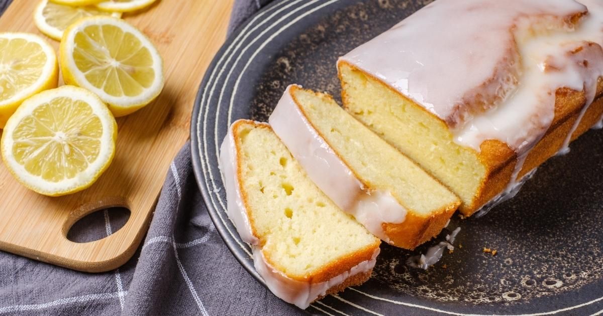 Glazed lemon pound cake cut on a plate