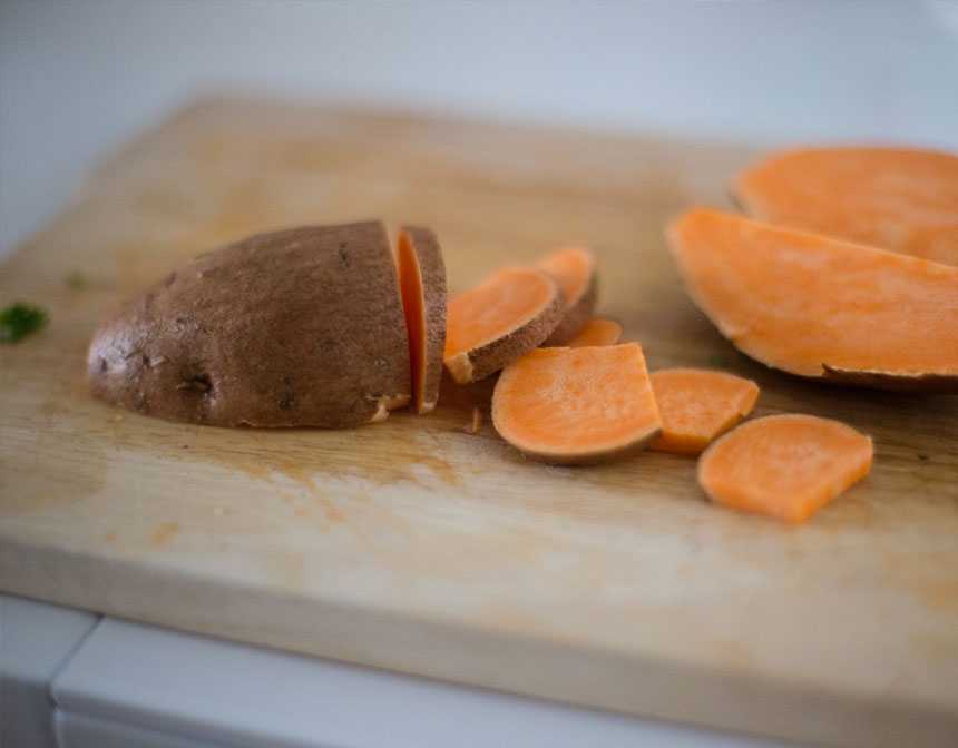 Sweet potatoes on cutting board