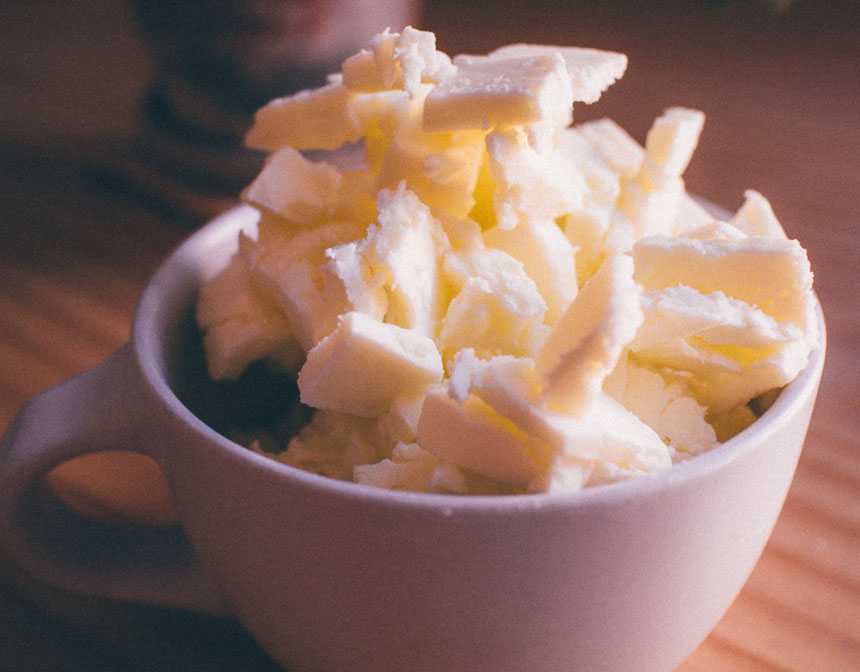 White ceramic mug with butter